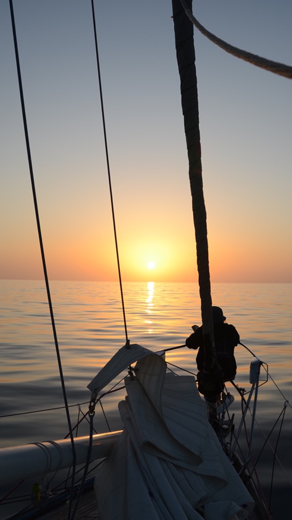 Sitting on the bow with a book at sunset Sitting on the bow with a book at sunset